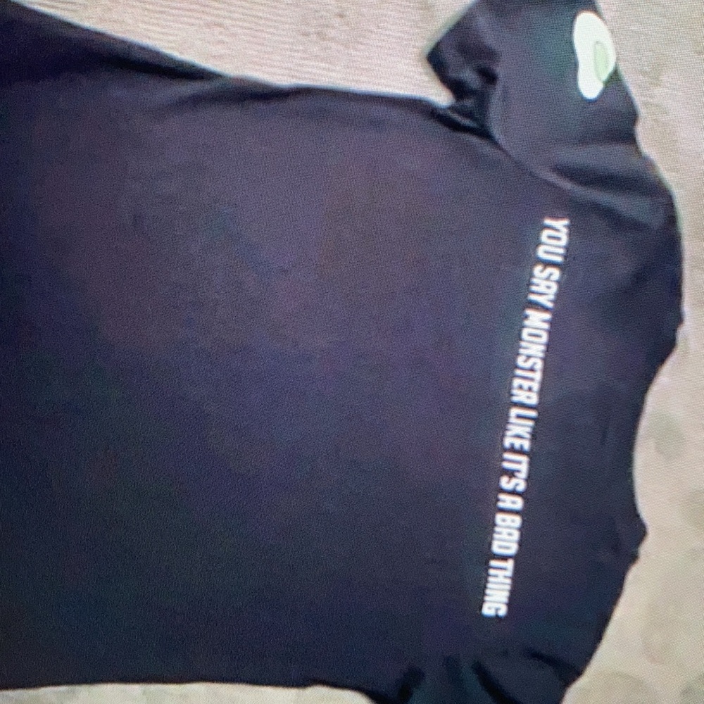 Simple letter design features Halloween tee